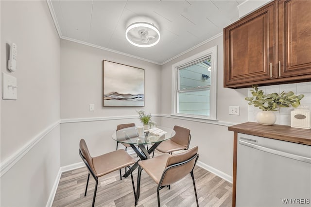 112 Southgate Rd, Cheektowaga, NY 14215 - dining area with light wood-type flooring and ornamental molding