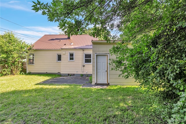 112 Southgate Rd, Cheektowaga, NY 14215 - back of property featuring a patio area and a metal roof