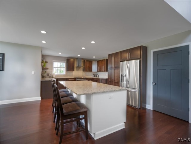 2480 Middle Rd, Oneida, NY 13421 - kitchen featuring stainless steel refrigerator with ice dispenser, a center island, dark wood-style flooring, recessed lighting, and wall chimney exhaust hood