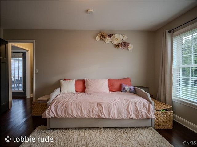 2480 Middle Rd, Oneida, NY 13421 - bedroom with multiple windows and wood finished floors