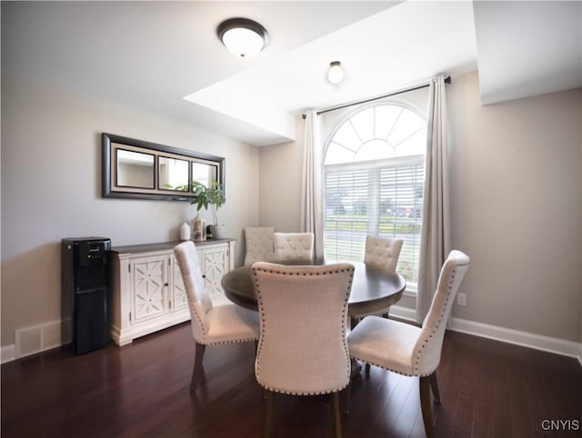 2480 Middle Rd, Oneida, NY 13421 - dining area featuring dark wood-style floors and baseboards