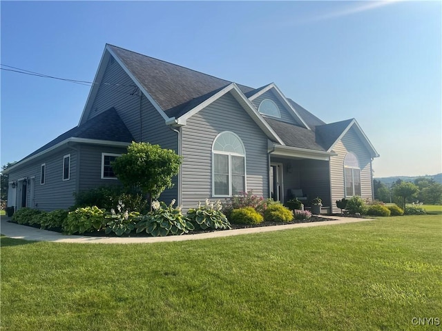 2480 Middle Rd, Oneida, NY 13421 - view of home's exterior featuring roof with shingles and a yard