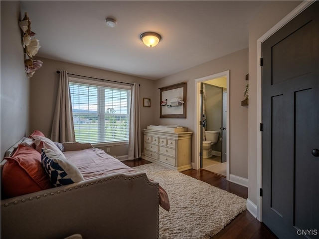 2480 Middle Rd, Oneida, NY 13421 - bedroom featuring dark wood-type flooring and ensuite bath