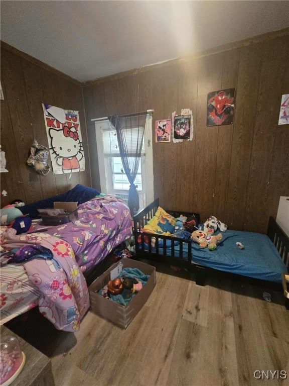 225 Lakeview Ave, Syracuse, NY 13204 - bedroom with wood finished floors and wood walls