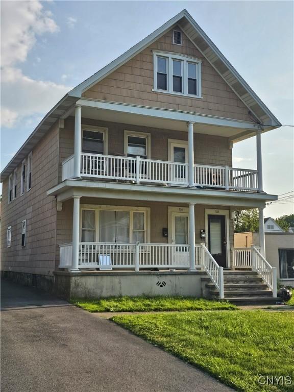 922924 Rutger St, Utica, NY 13501 - view of front of home with a balcony and covered porch