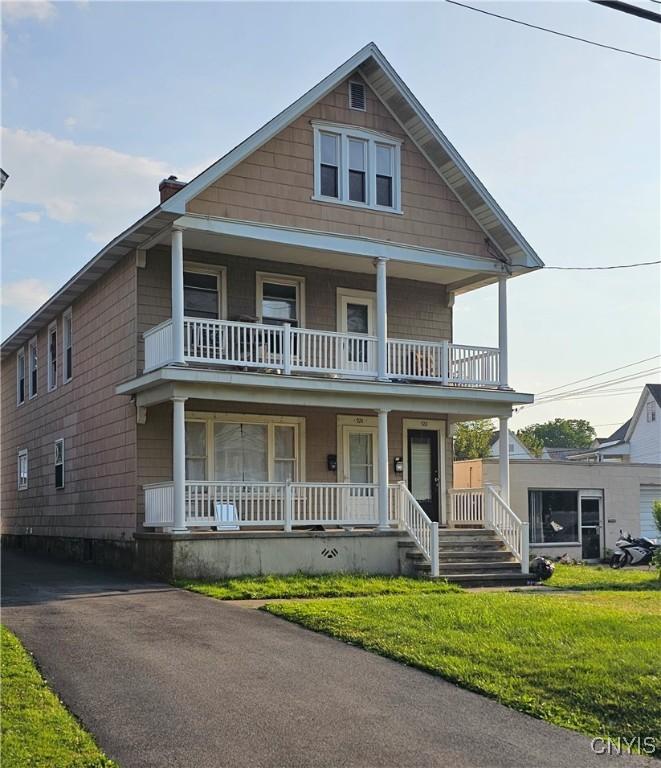 922924 Rutger St, Utica, NY 13501 - view of front of property with covered porch and a balcony