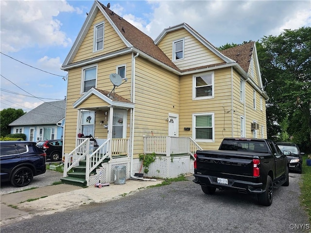 1125 Adams St, Utica, NY 13501 - traditional home with a shingled roof