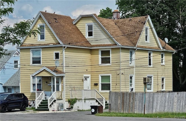 1125 Adams St, Utica, NY 13501 - view of front of property featuring a chimney