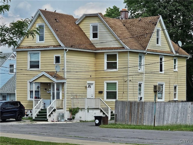 1125 Adams St, Utica, NY 13501 - view of front of house featuring a chimney
