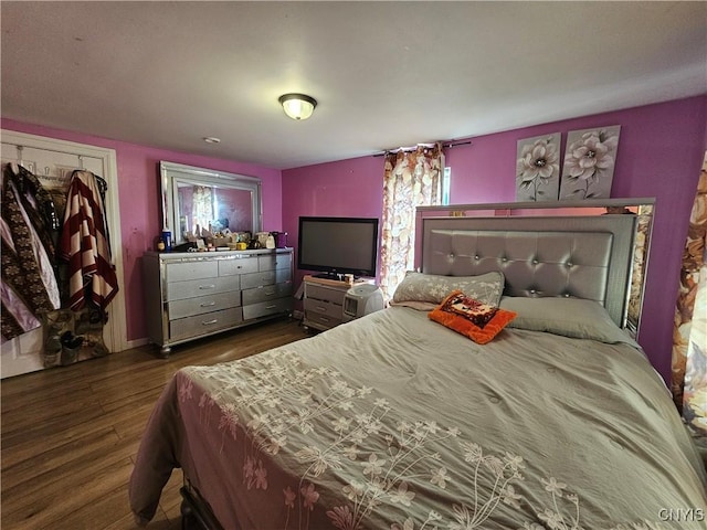 1125 Adams St, Utica, NY 13501 - bedroom featuring wood finished floors