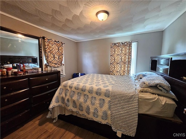 1125 Adams St, Utica, NY 13501 - bedroom with dark wood-style floors and crown molding