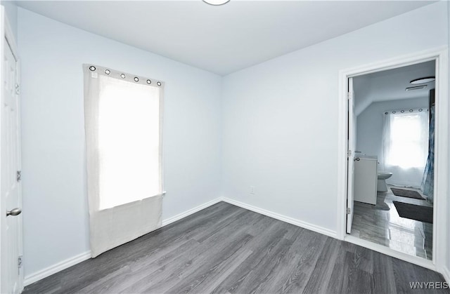 290 Riverside Ave, Buffalo, NY 14207 - unfurnished bedroom with dark wood-type flooring and ensuite bathroom