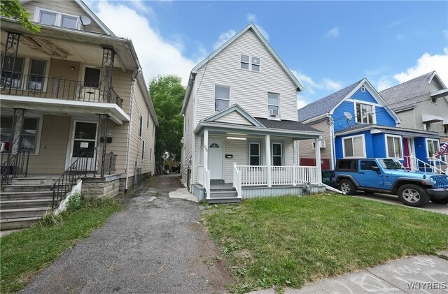290 Riverside Ave, Buffalo, NY 14207 - view of front of house featuring a porch and a front lawn