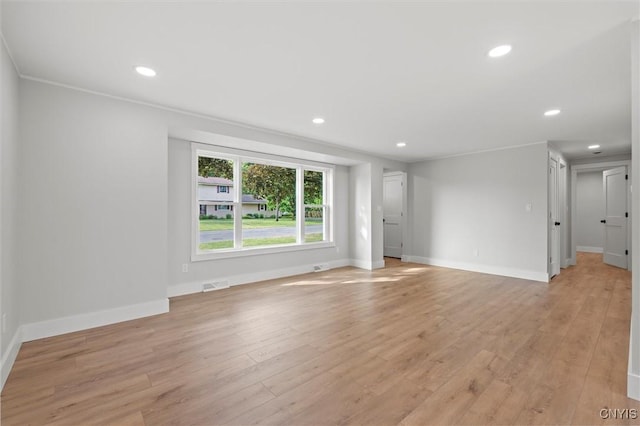 105 Benoit Dr, Geddes, NY 13209 - empty room with light wood-style floors and recessed lighting