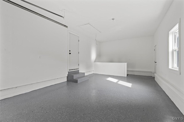 105 Benoit Dr, Geddes, NY 13209 - garage featuring baseboard heating