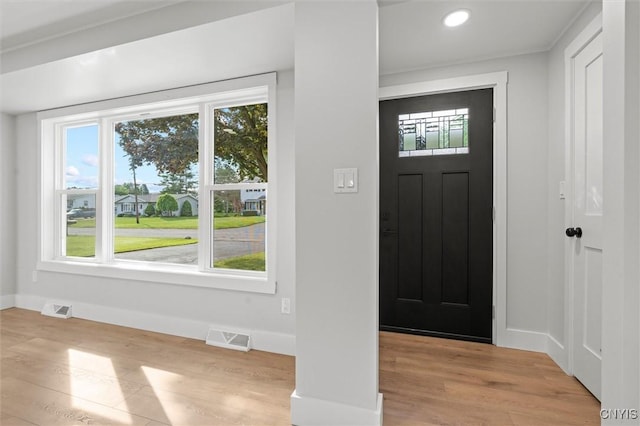 105 Benoit Dr, Geddes, NY 13209 - foyer entrance featuring plenty of natural light, light wood-style flooring, and recessed lighting