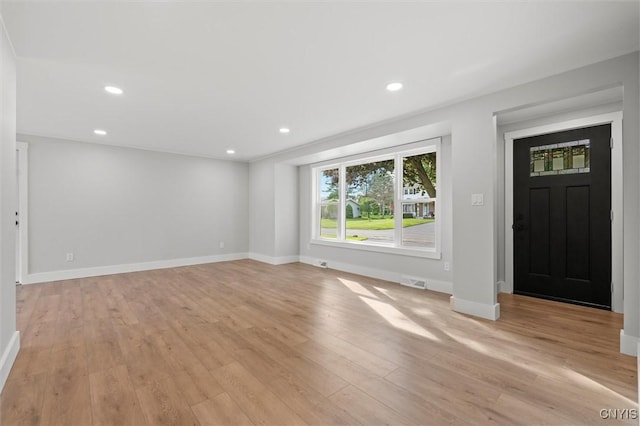 105 Benoit Dr, Geddes, NY 13209 - entrance foyer with light wood-style flooring and recessed lighting