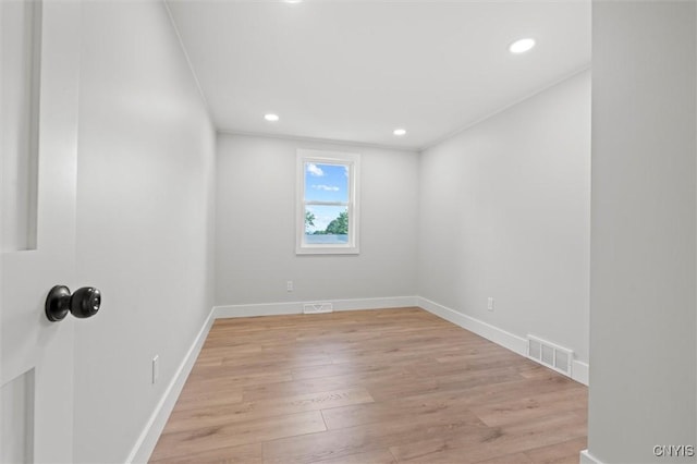 105 Benoit Dr, Geddes, NY 13209 - empty room featuring light wood-type flooring and recessed lighting