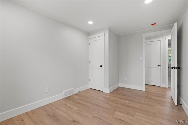 105 Benoit Dr, Geddes, NY 13209 - unfurnished bedroom with light wood-type flooring and recessed lighting