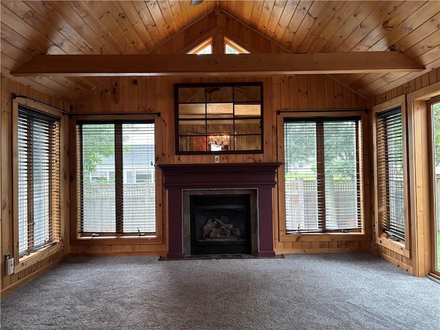 20-22 N Belmont Cir, Oneonta, NY 13820 - unfurnished living room featuring wood walls, healthy amount of natural light, carpet flooring, and wood ceiling