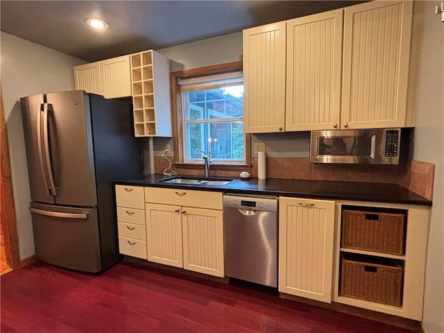 20-22 N Belmont Cir, Oneonta, NY 13820 - kitchen with appliances with stainless steel finishes, dark wood-type flooring, dark countertops, and recessed lighting