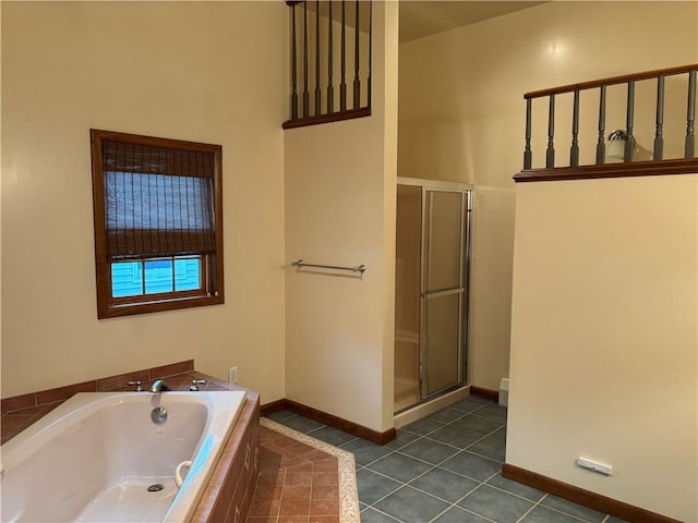 20-22 N Belmont Cir, Oneonta, NY 13820 - full bath featuring a stall shower, tile patterned floors, and a bath