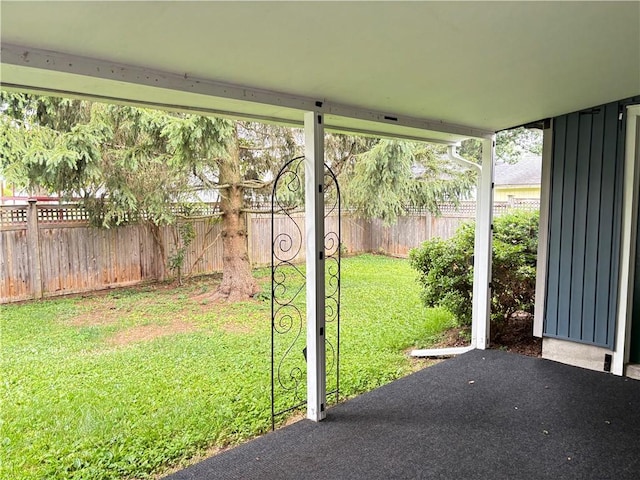 20-22 N Belmont Cir, Oneonta, NY 13820 - fenced backyard with a patio area