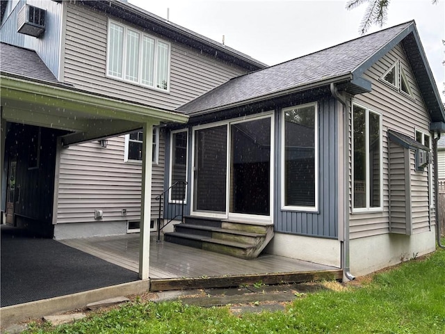 20-22 N Belmont Cir, Oneonta, NY 13820 - view of home's exterior featuring entry steps, roof with shingles, and a deck