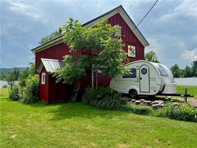 44 Bloom St, Butternuts, NY 13776 - view of side of home with board and batten siding