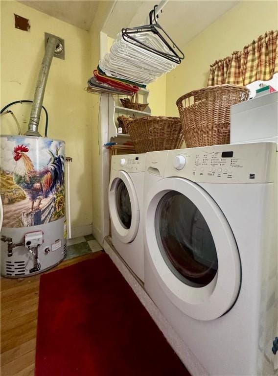 44 Bloom St, Butternuts, NY 13776 - laundry room with water heater, washer and clothes dryer, and wood finished floors
