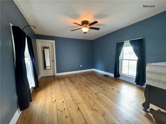 44 Bloom St, Butternuts, NY 13776 - unfurnished bedroom with light wood-type flooring and a ceiling fan