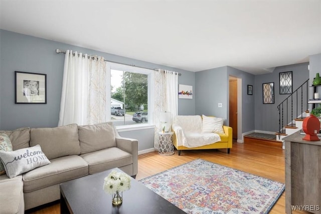 451 Moore Ave, Tonawanda, NY 14223 - living room featuring stairs and wood finished floors