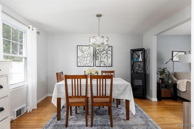 451 Moore Ave, Tonawanda, NY 14223 - dining room with light wood-style floors