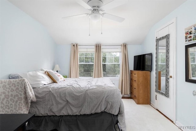 451 Moore Ave, Tonawanda, NY 14223 - bedroom with vaulted ceiling, light colored carpet, and a ceiling fan