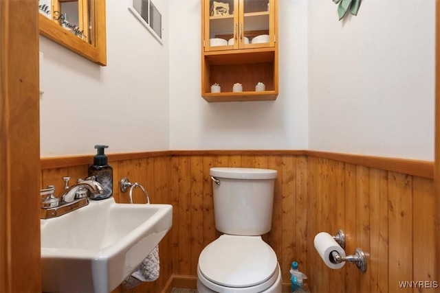 451 Moore Ave, Tonawanda, NY 14223 - bathroom featuring a wainscoted wall and a sink