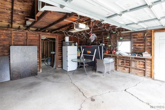 451 Moore Ave, Tonawanda, NY 14223 - garage featuring a garage door opener