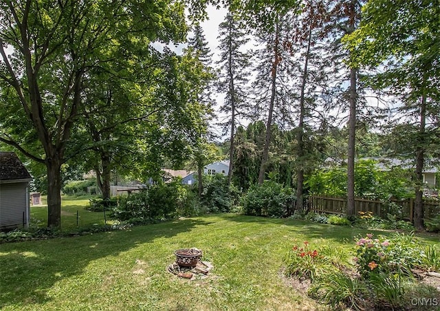112 Haverhill Dr, Dewitt, NY 13214 - view of yard featuring a fire pit