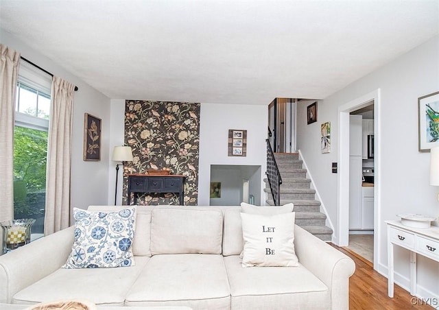 112 Haverhill Dr, Dewitt, NY 13214 - living area featuring stairway and light wood-style floors