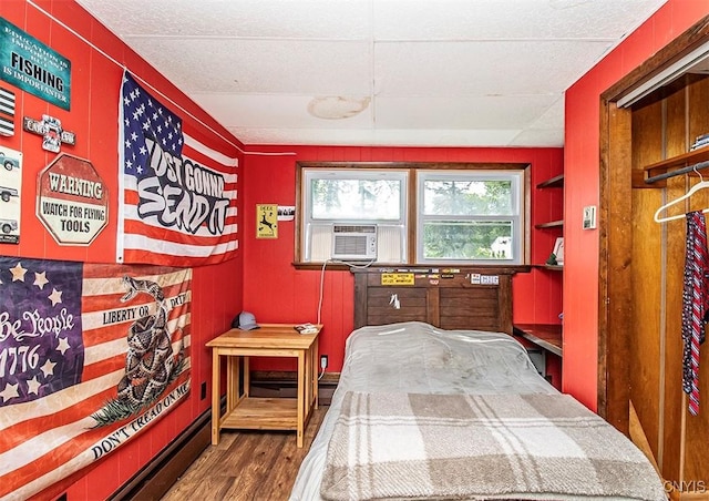 112 Haverhill Dr, Dewitt, NY 13214 - bedroom with wood finished floors and cooling unit