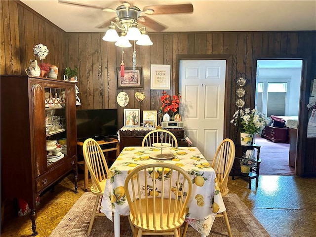 750 Reservoir St, Elmira City, NY 14905 - dining area with ceiling fan and wooden walls