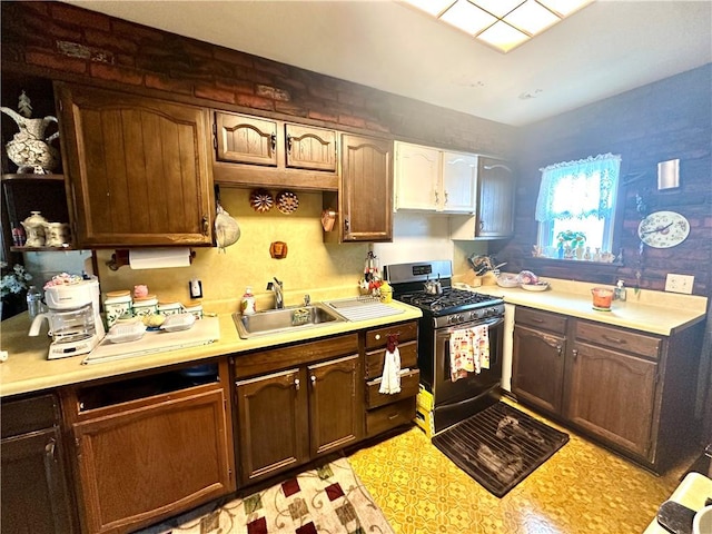 750 Reservoir St, Elmira City, NY 14905 - kitchen with stainless steel gas range oven, light countertops, and open shelves