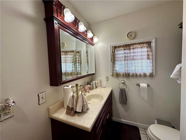 750 Reservoir St, Elmira City, NY 14905 - bathroom featuring vanity, healthy amount of natural light, and tile patterned flooring
