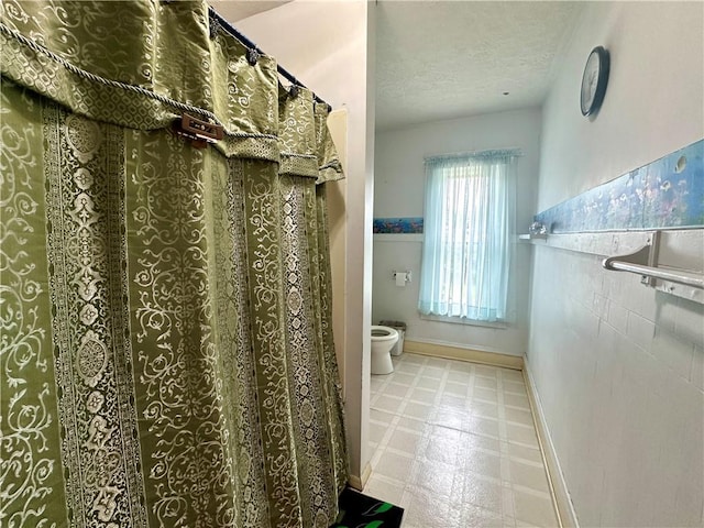 750 Reservoir St, Elmira City, NY 14905 - bathroom featuring tile patterned floors and a textured ceiling