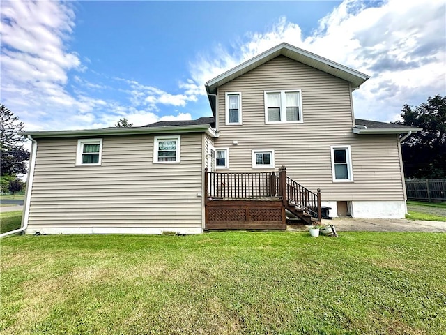 750 Reservoir St, Elmira City, NY 14905 - rear view of property featuring a wooden deck and a yard