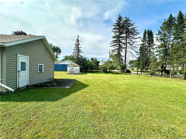 750 Reservoir St, Elmira City, NY 14905 - view of green lawn featuring a shed
