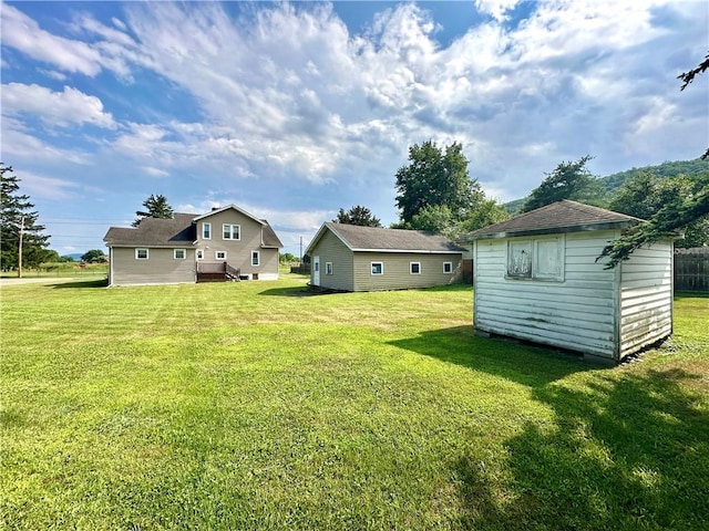 750 Reservoir St, Elmira City, NY 14905 - view of green lawn with a shed
