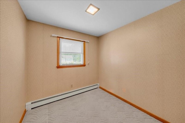 12 Sunset Dr, Afton, NY 13730 - unfurnished room with baseboard heating and carpet floors