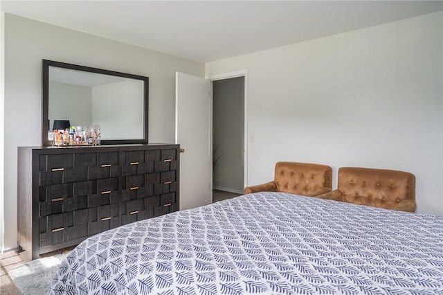 34 Stonewall Ct, Greece, NY 14615 - carpeted bedroom featuring baseboards
