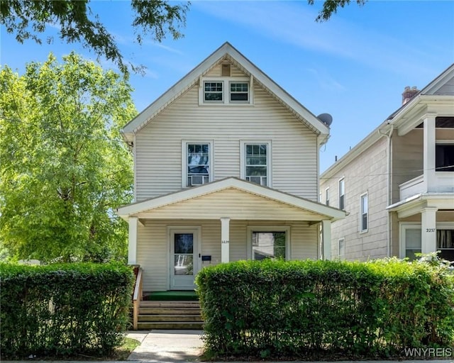 2239 Willow Ave, Niagara Falls, NY 14305 - american foursquare style home with a porch