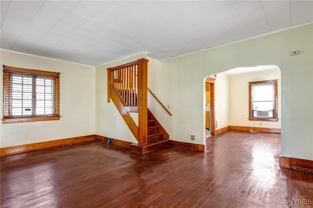 2239 Willow Ave, Niagara Falls, NY 14305 - empty room with arched walkways, crown molding, stairs, and wood finished floors